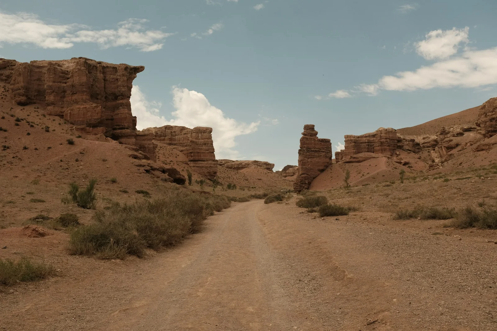 A dirt road between the rock formations of Charyn Canyon in Kazakhstan