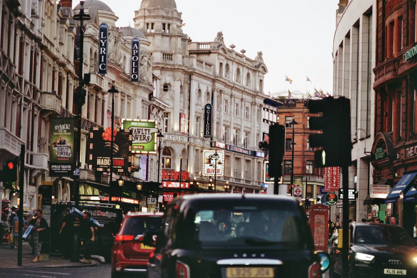 Buildings and traffic on a London street, photographed on film