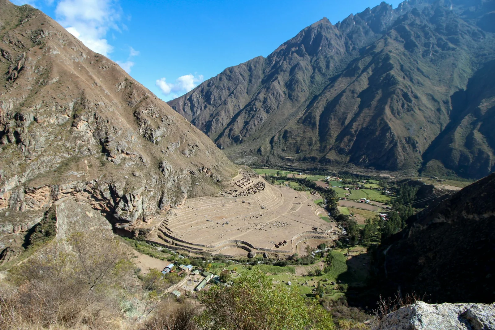 A broad valley between the mountains of the Peruvian Andes